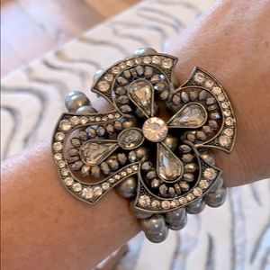 Faux pearl and cross bracelet